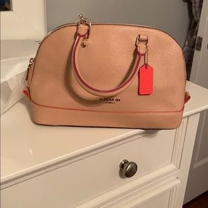 Light beige, pink and orange Coach purse
